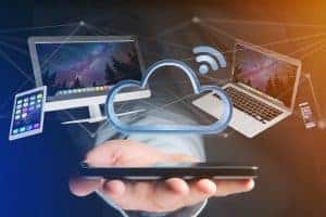 Devices like smartphone tablet or computer flying over connected cloud