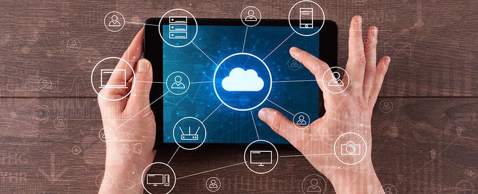 Man using tablet and cloud services
